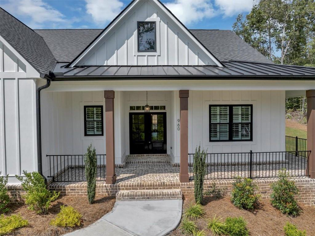960 Oxford Road Ball Ground, GA 30107 - Photo 5 of 54 front view of a house