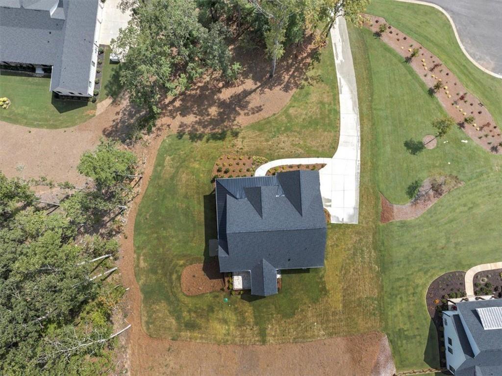 960 Oxford Road Ball Ground, GA 30107 - Photo 54 of 54 an aerial view of a house with swimming pool