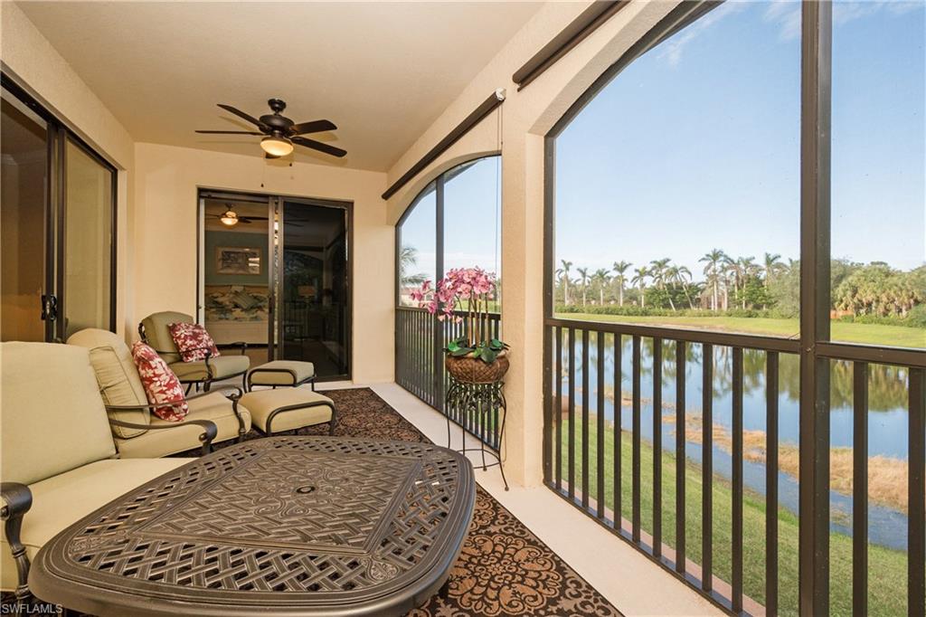 9511 Napoli Lane, Unit 202 Naples, FL 34113 - Photo 16 of 24 a living room with furniture