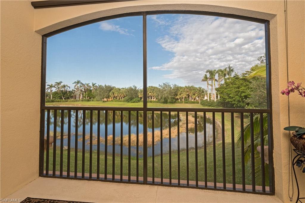 9511 Napoli Lane, Unit 202 Naples, FL 34113 - Photo 20 of 24 a view of a balcony with wooden floor