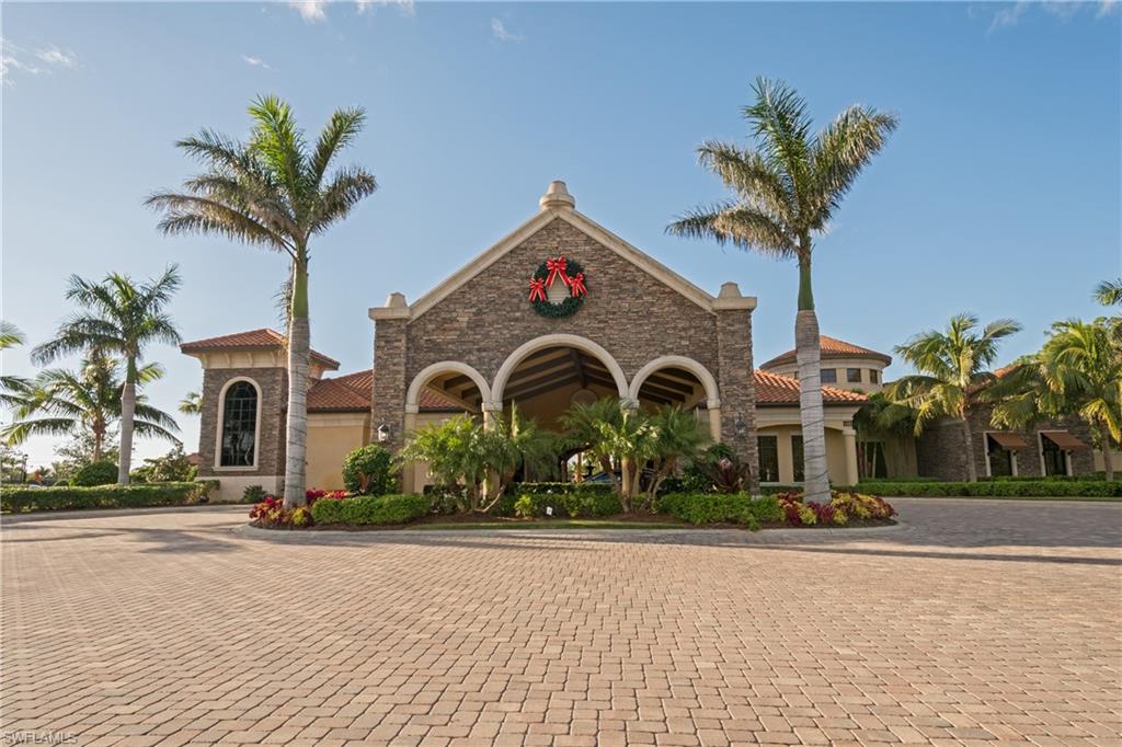 9511 Napoli Lane, Unit 202 Naples, FL 34113 - Photo 23 of 24 a front view of multiple house with yard