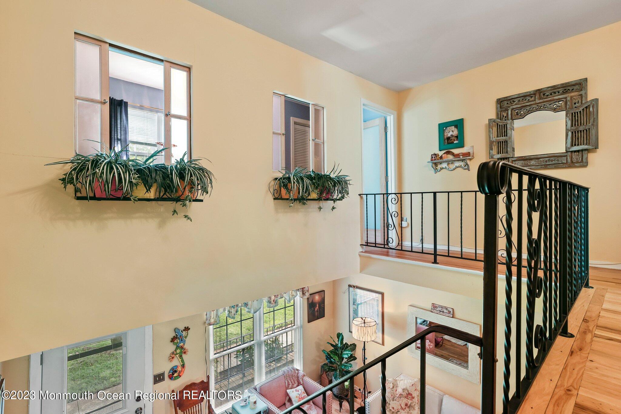 301 Spring Street, Unit 1 Red Bank, NJ 07701 - Photo 16 of 23 a view of balcony with furniture and stairs