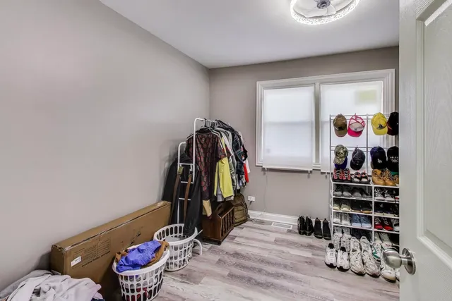 a view of a closet with storage