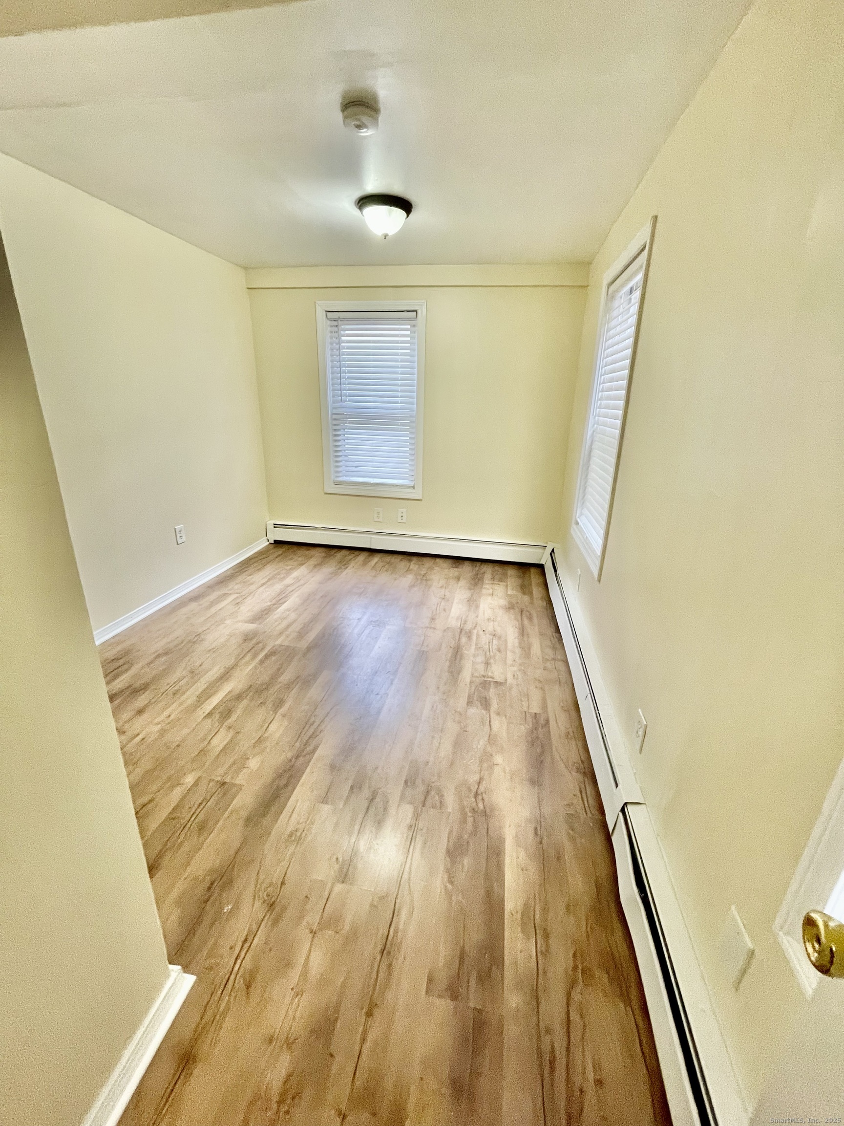 92 West Main Street, Unit 3 Vernon, CT 06066 - Photo 5 of 13 view of wooden floor
