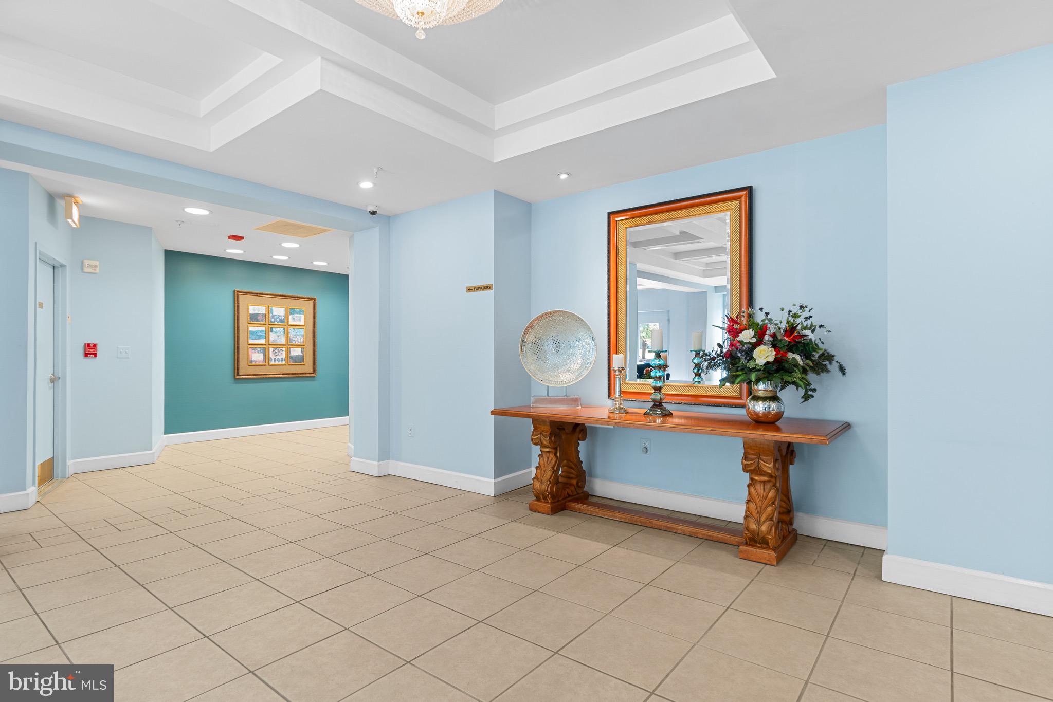 3005 South Leisure World Boulevard, Unit 702 Silver Spring, MD 20906 - Photo 27 of 43 a living room with furniture