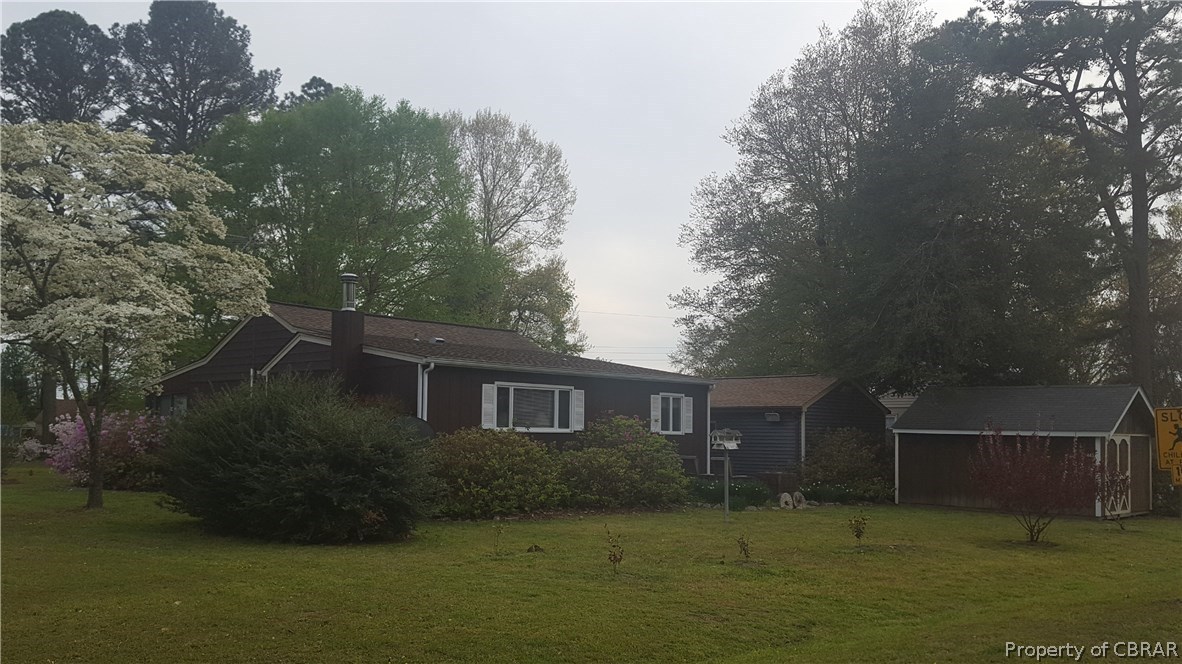 443 Sanders Landing Road North, VA 23128 - Photo 3 of 17 Back of home shed and garage