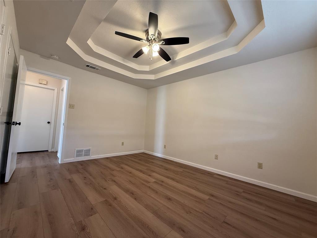 526 Post Oak Lane Allen, TX 75002 - Photo 11 of 18 wooden floor in an empty room