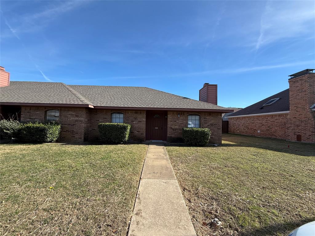 526 Post Oak Lane Allen, TX 75002 - Photo 17 of 18 a front view of a house with a yard