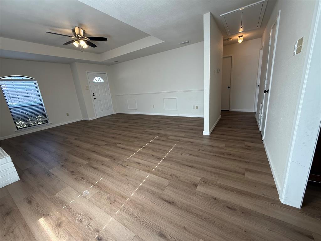 526 Post Oak Lane Allen, TX 75002 - Photo 4 of 18 a view of an empty room and wooden floor