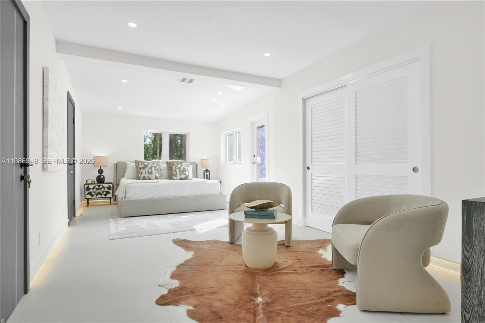 8220 Southwest 133rd Street Pinecrest, FL 33156 - Photo 14 of 34 a living room with furniture