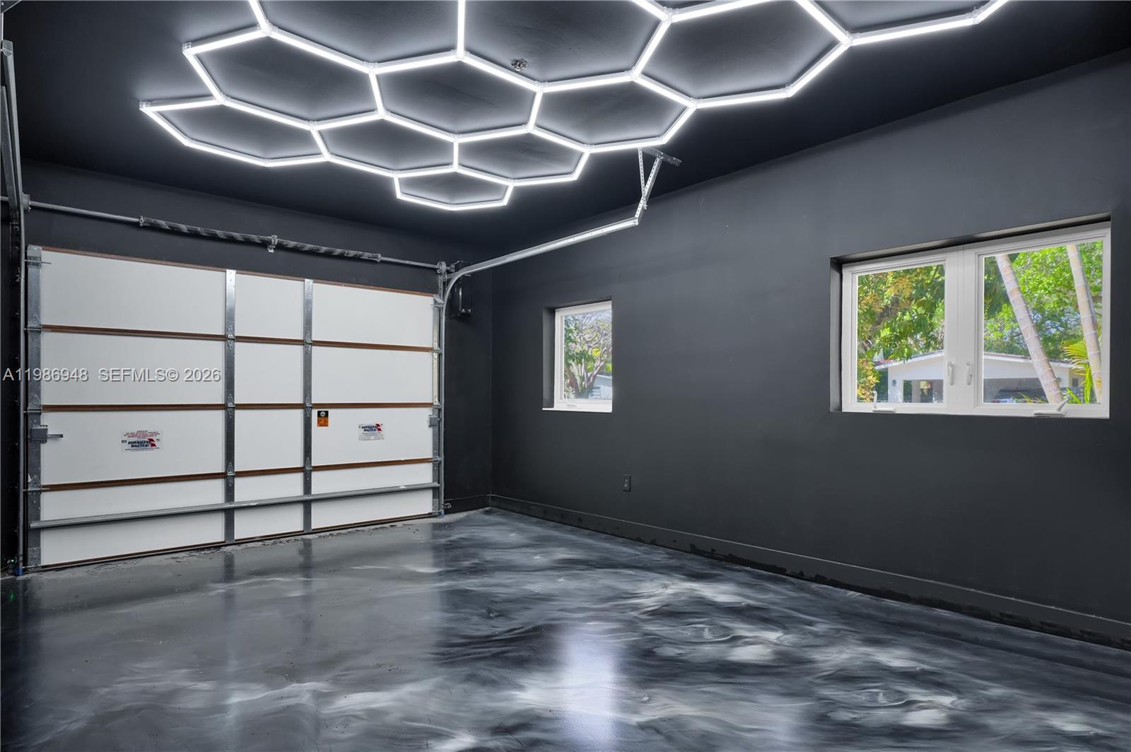 8220 Southwest 133rd Street Pinecrest, FL 33156 - Photo 25 of 34 a view of a livingroom with a large window