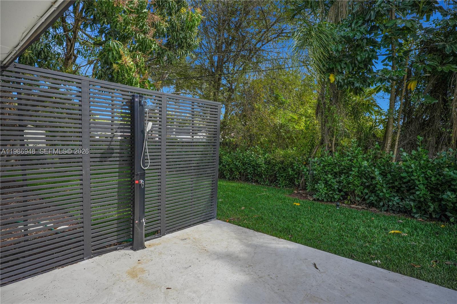 8220 Southwest 133rd Street Pinecrest, FL 33156 - Photo 28 of 34 a view of a pathway of a building