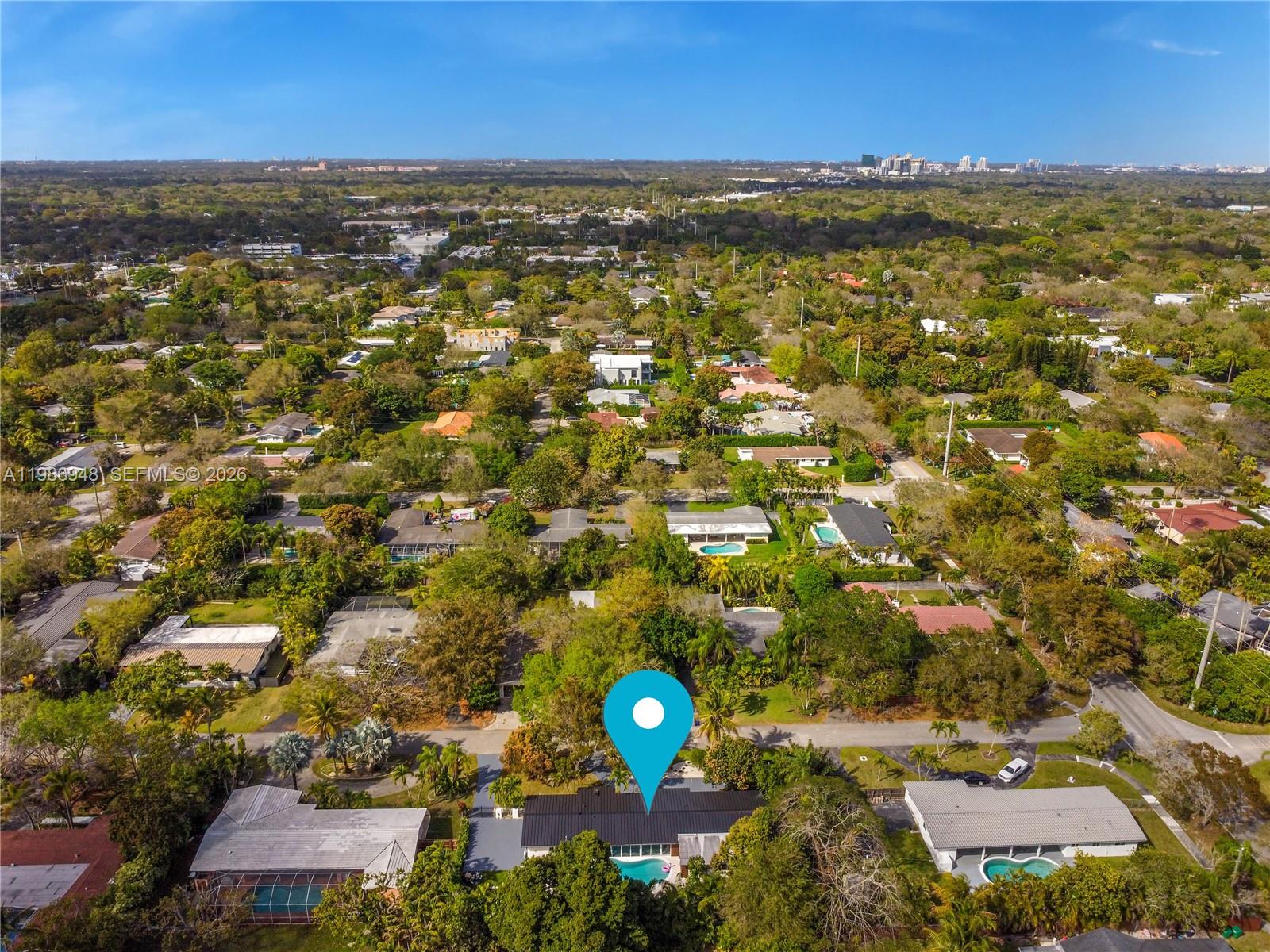 8220 Southwest 133rd Street Pinecrest, FL 33156 - Photo 33 of 34 a view of a city with an ocean