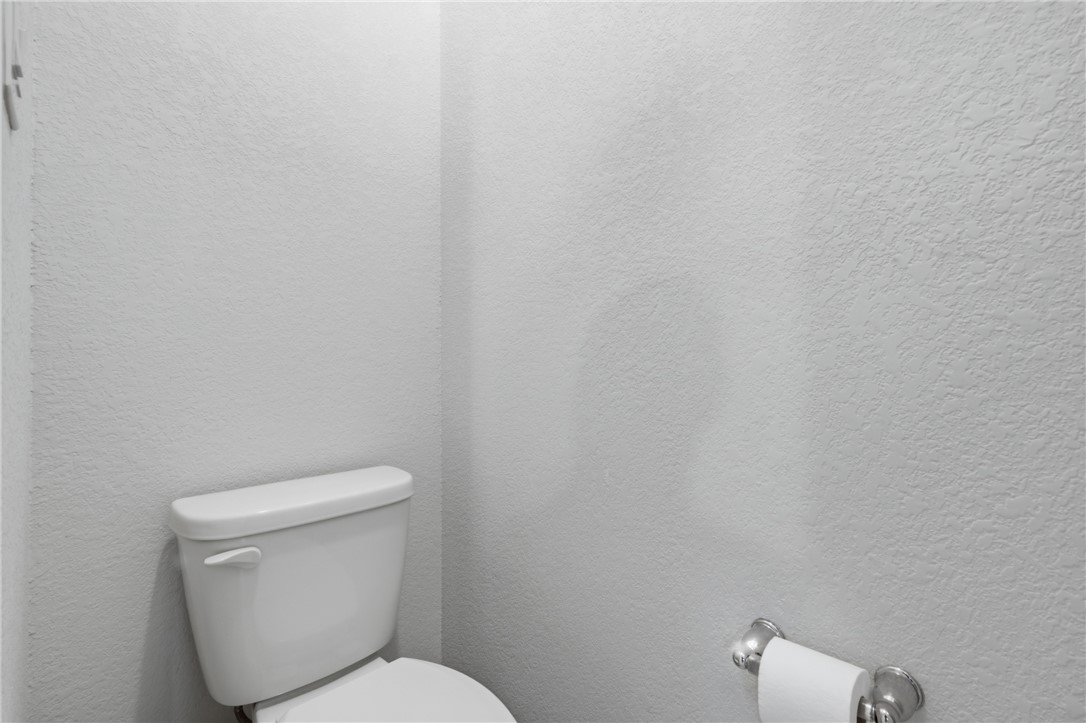1943 Thorndyke Lane Bryan, TX 77807 - Photo 23 of 28 Private water closet in the primary bathroom