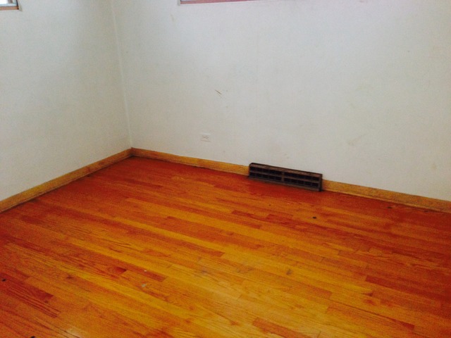 517 North McAree Road Waukegan, IL 60085 - Photo 4 of 10 a view of empty room with wooden floor