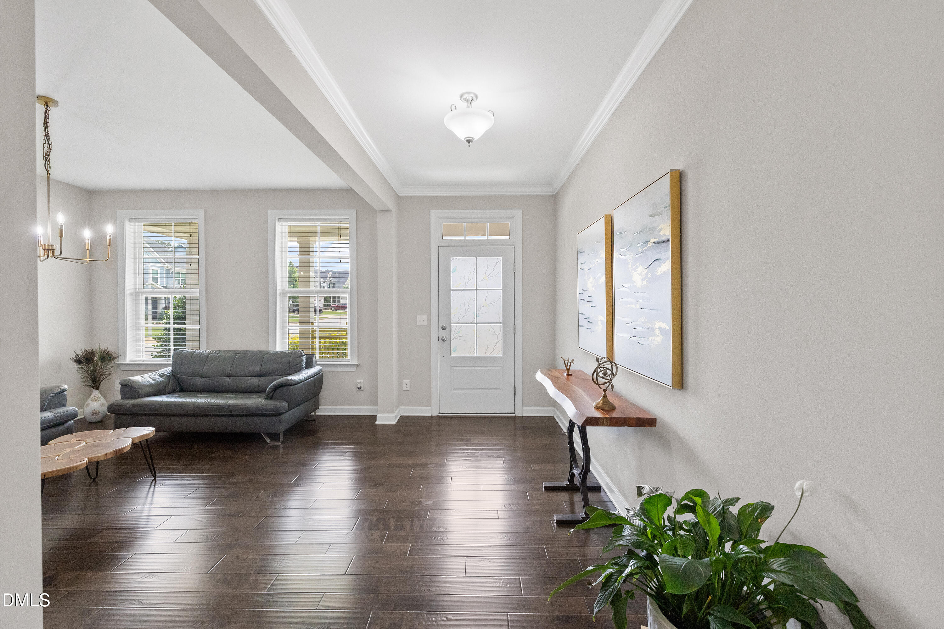 8059 Gilano Drive Raleigh, NC 27603 - Photo 10 of 43 a living room with furniture and wooden floor