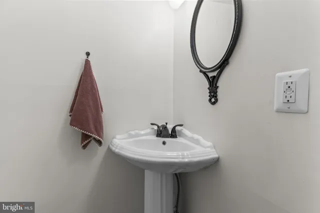 a kitchen with stainless steel appliances a stove refrigerator sink and microwave