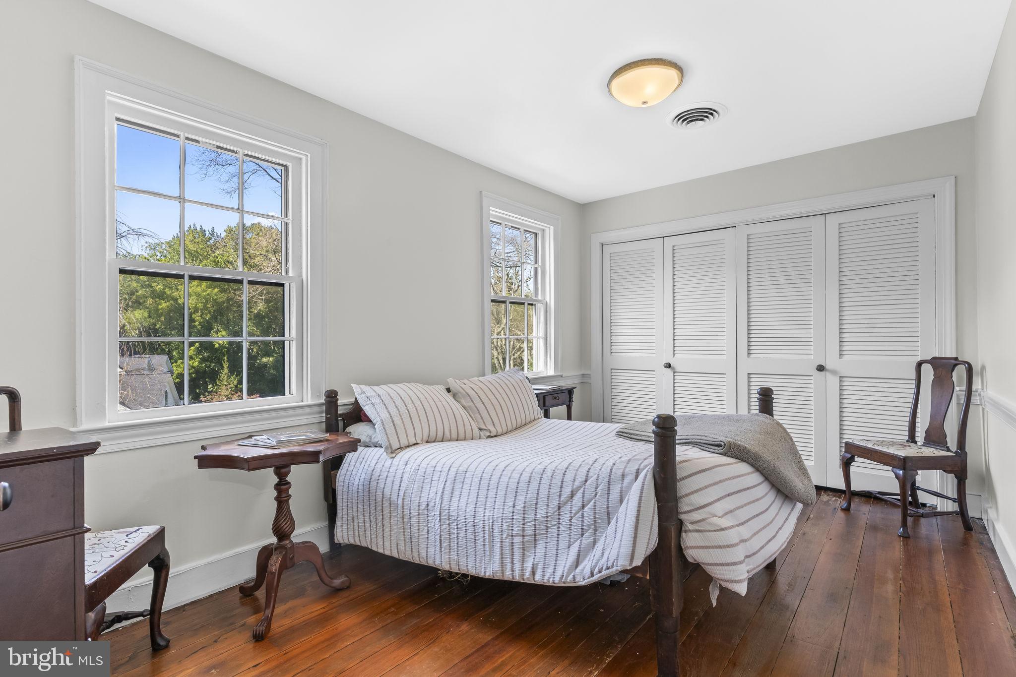 525 Small Reward Road Huntingtown, MD 20639 - Photo 33 of 67 a bedroom with a bed and a window