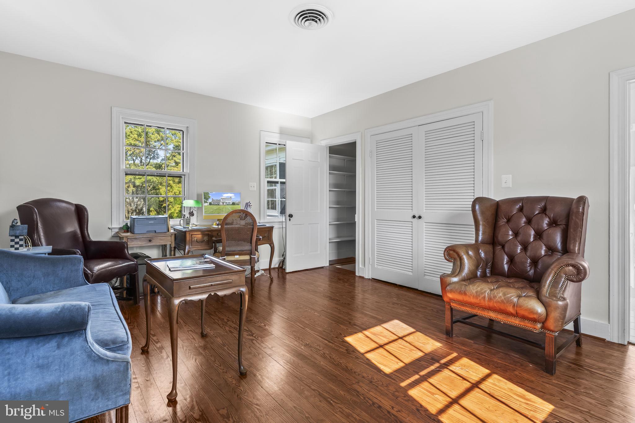 525 Small Reward Road Huntingtown, MD 20639 - Photo 35 of 67 a living room with furniture and wooden floor