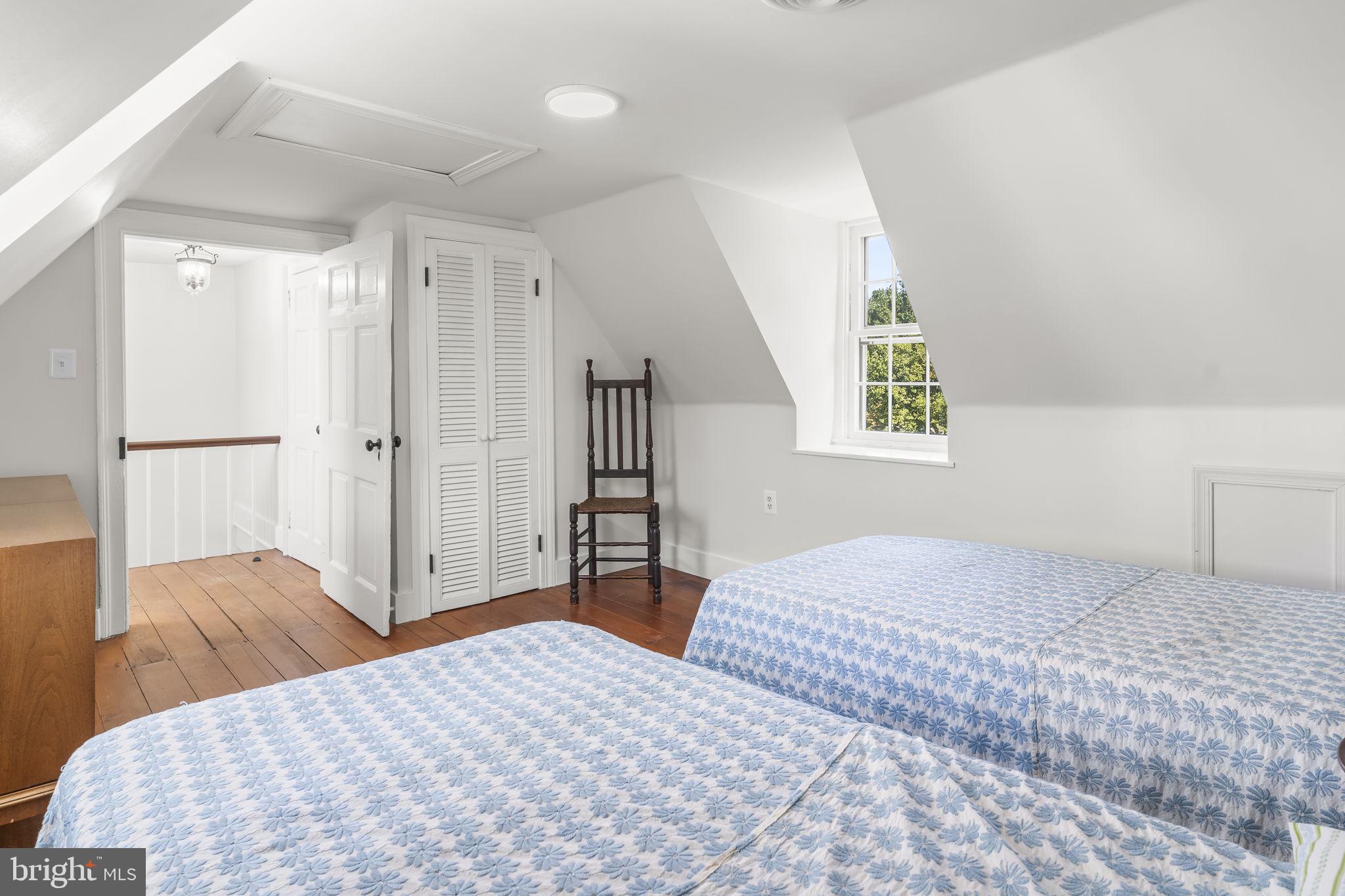 525 Small Reward Road Huntingtown, MD 20639 - Photo 39 of 67 a bedroom with a bed and a window