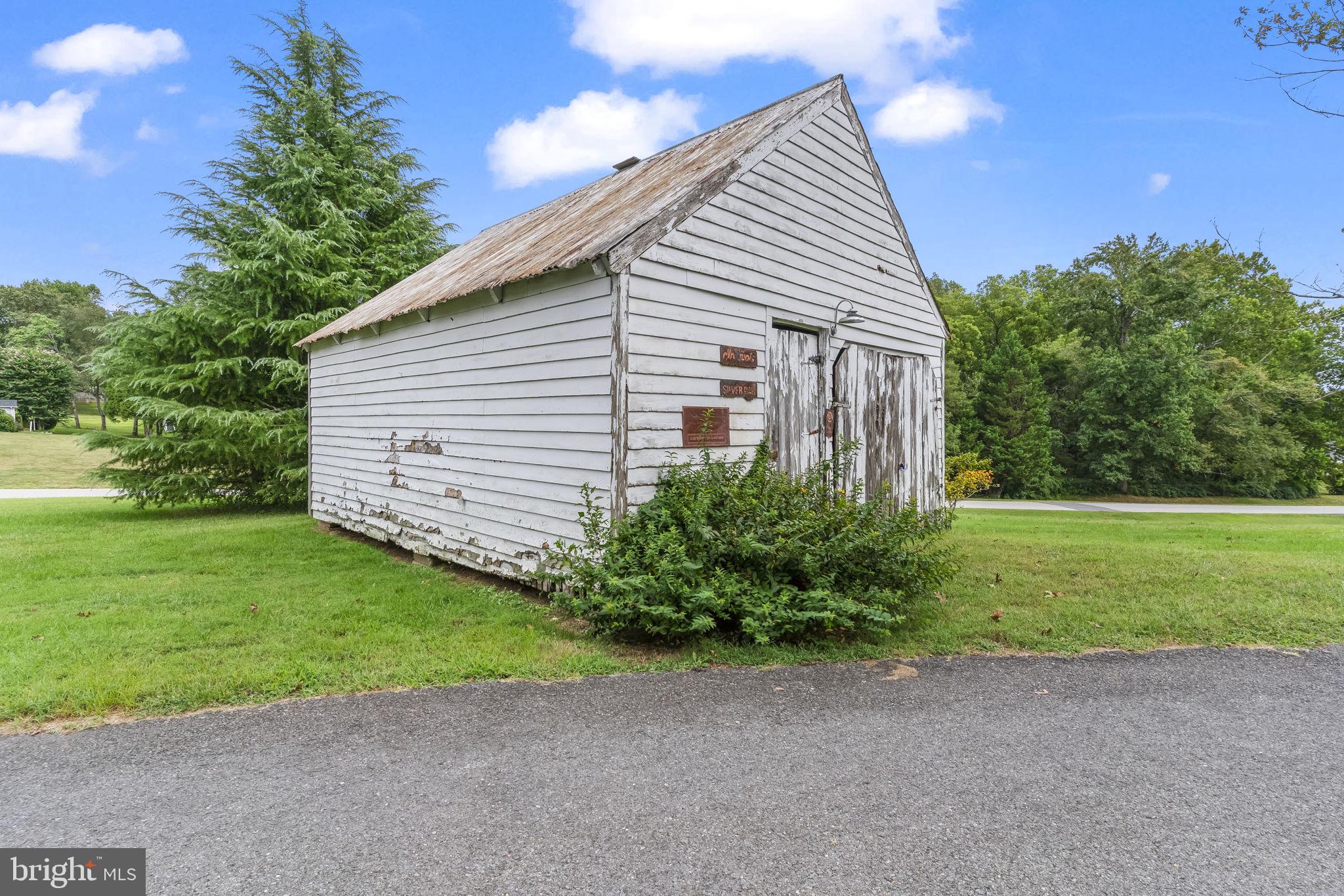 525 Small Reward Road Huntingtown, MD 20639 - Photo 43 of 67 a view of a house with a yard