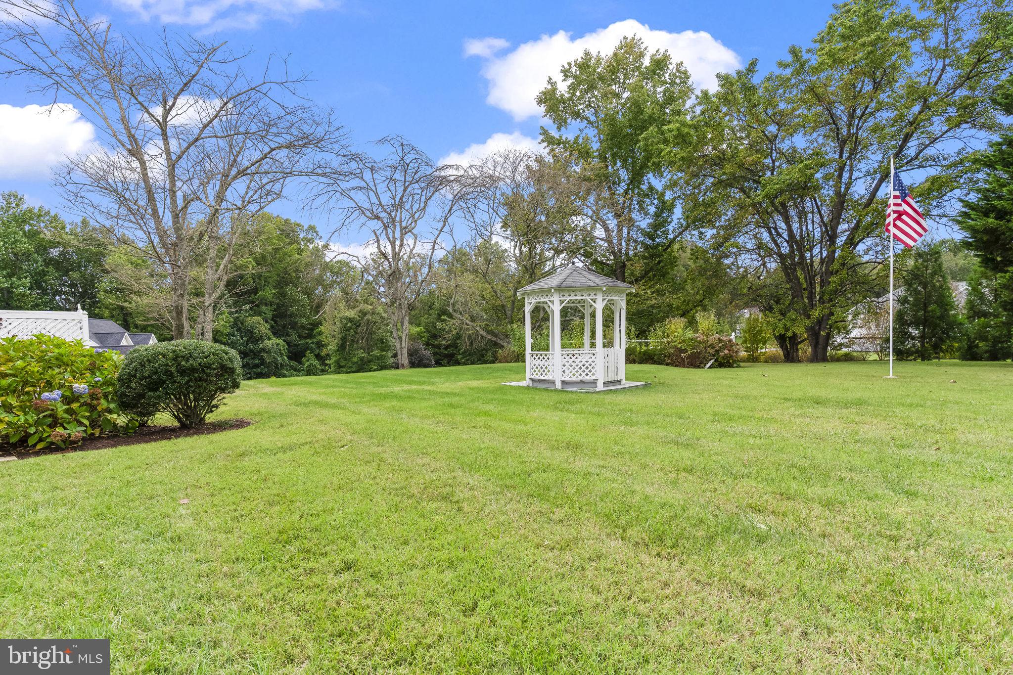 525 Small Reward Road Huntingtown, MD 20639 - Photo 46 of 67 a view of a house with a yard