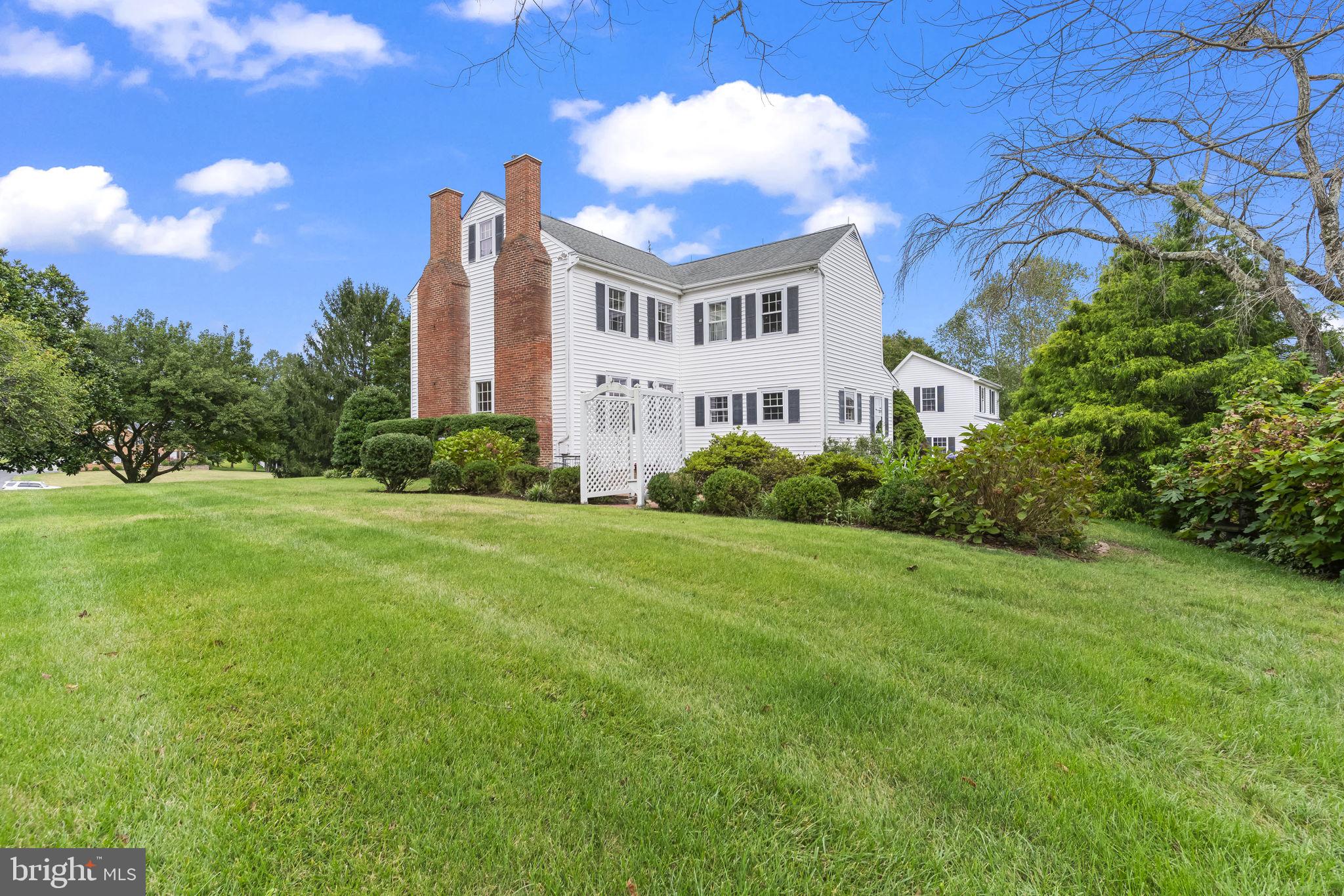525 Small Reward Road Huntingtown, MD 20639 - Photo 47 of 67 a view of a big yard with plants and large trees