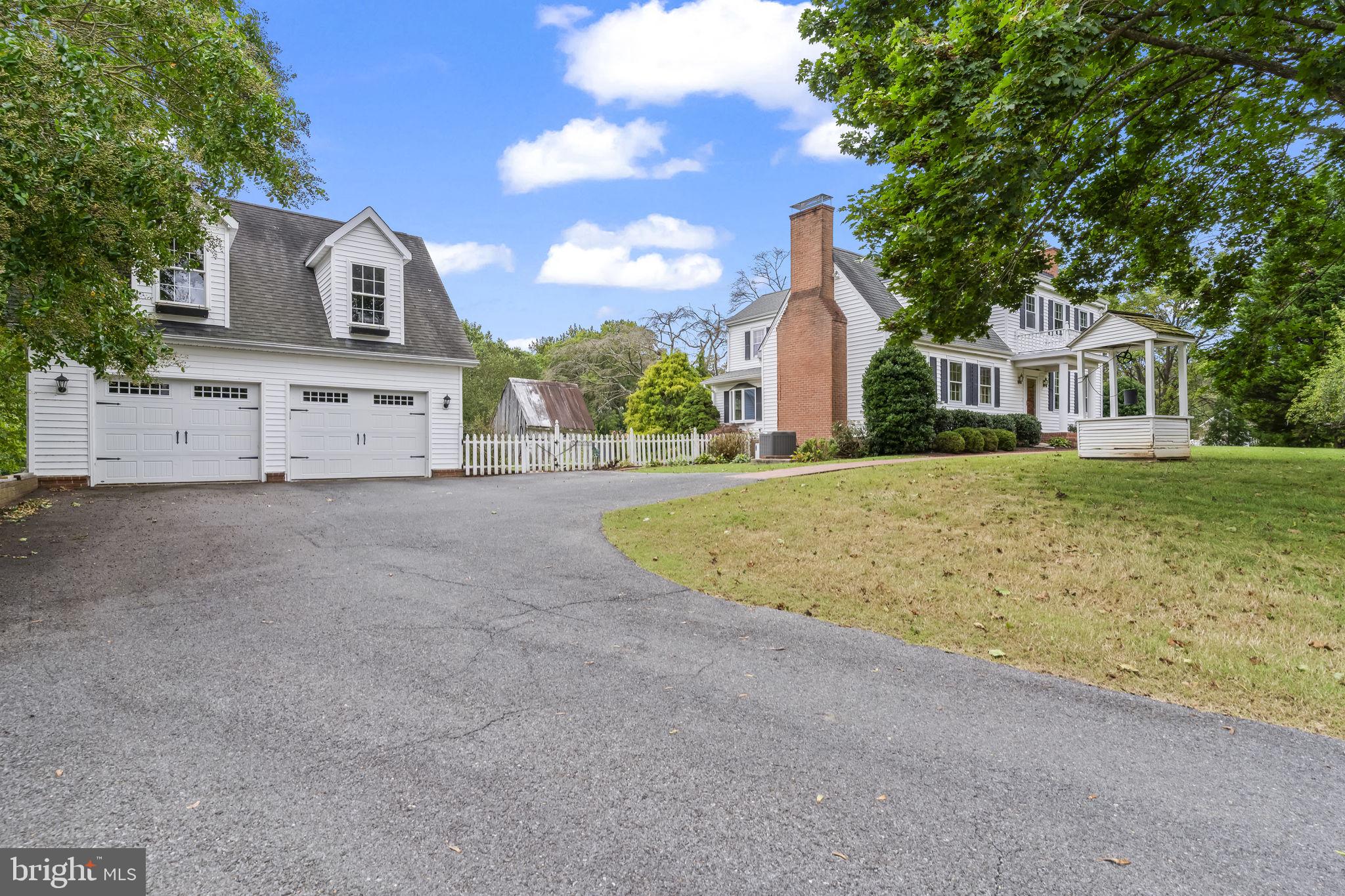 525 Small Reward Road Huntingtown, MD 20639 - Photo 49 of 67 front view of a house with a big yard