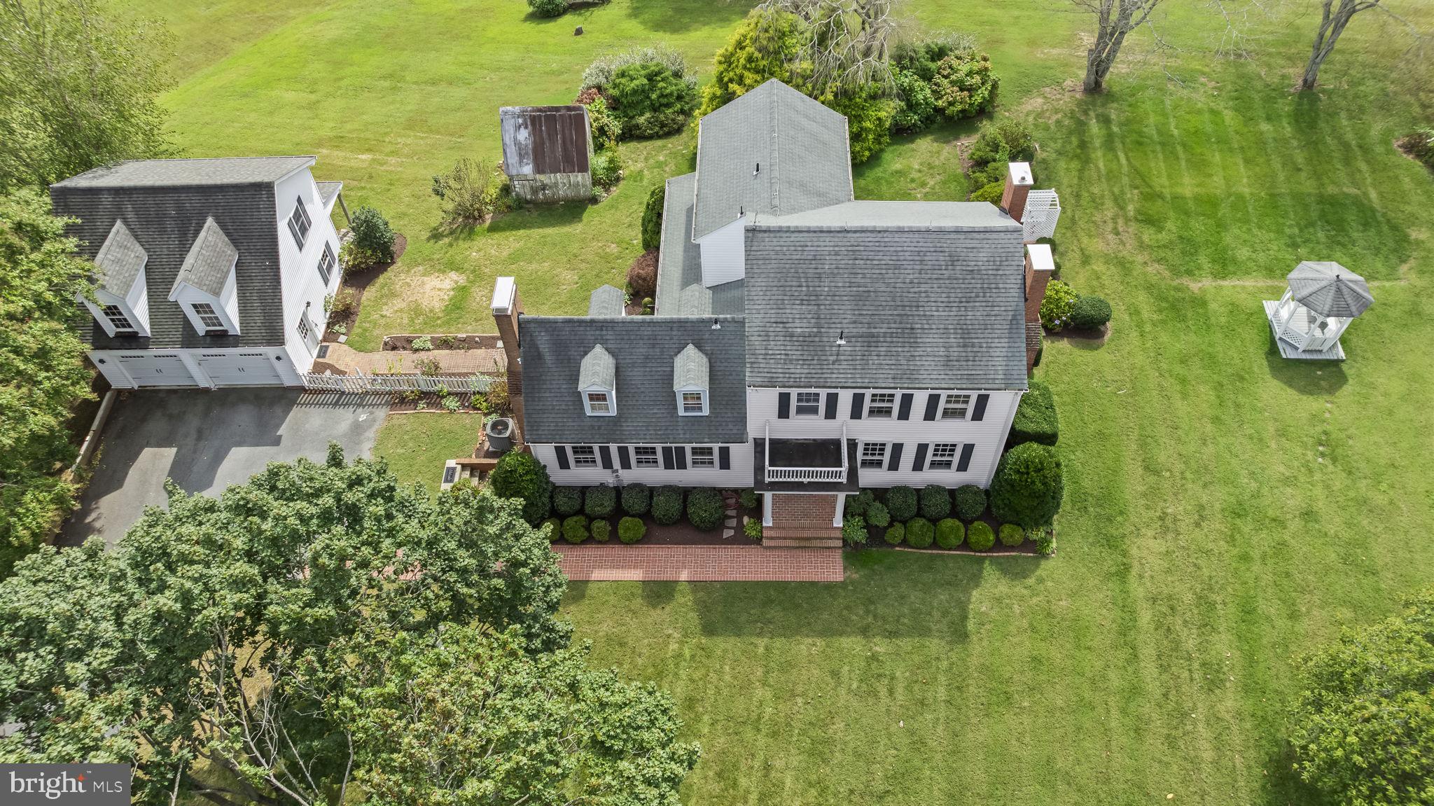 525 Small Reward Road Huntingtown, MD 20639 - Photo 53 of 67 an aerial view of a house with garden space and street view