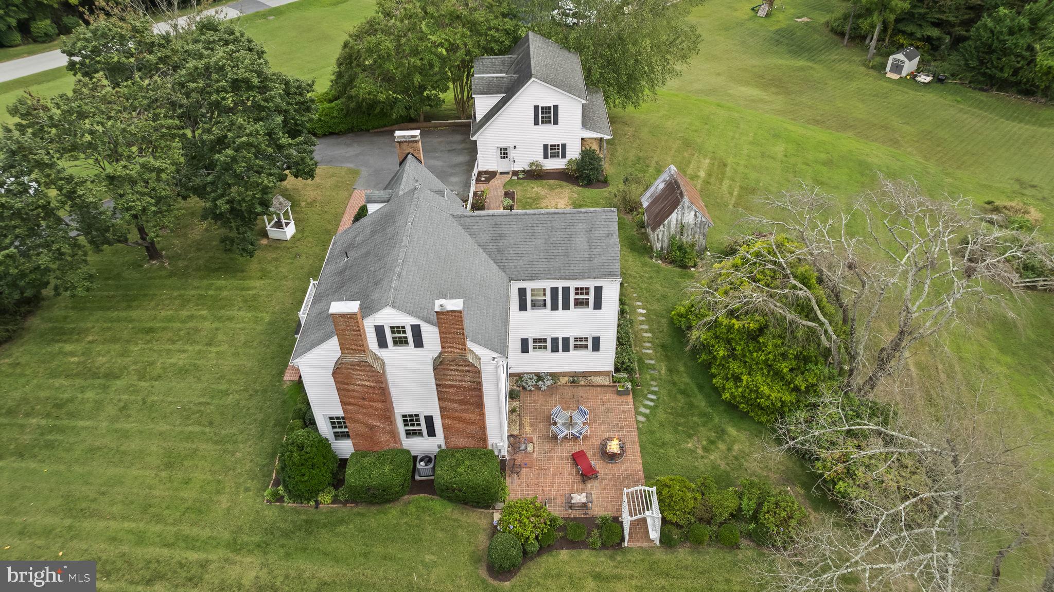 525 Small Reward Road Huntingtown, MD 20639 - Photo 53 of 67 an aerial view of a house with swimming pool and garden