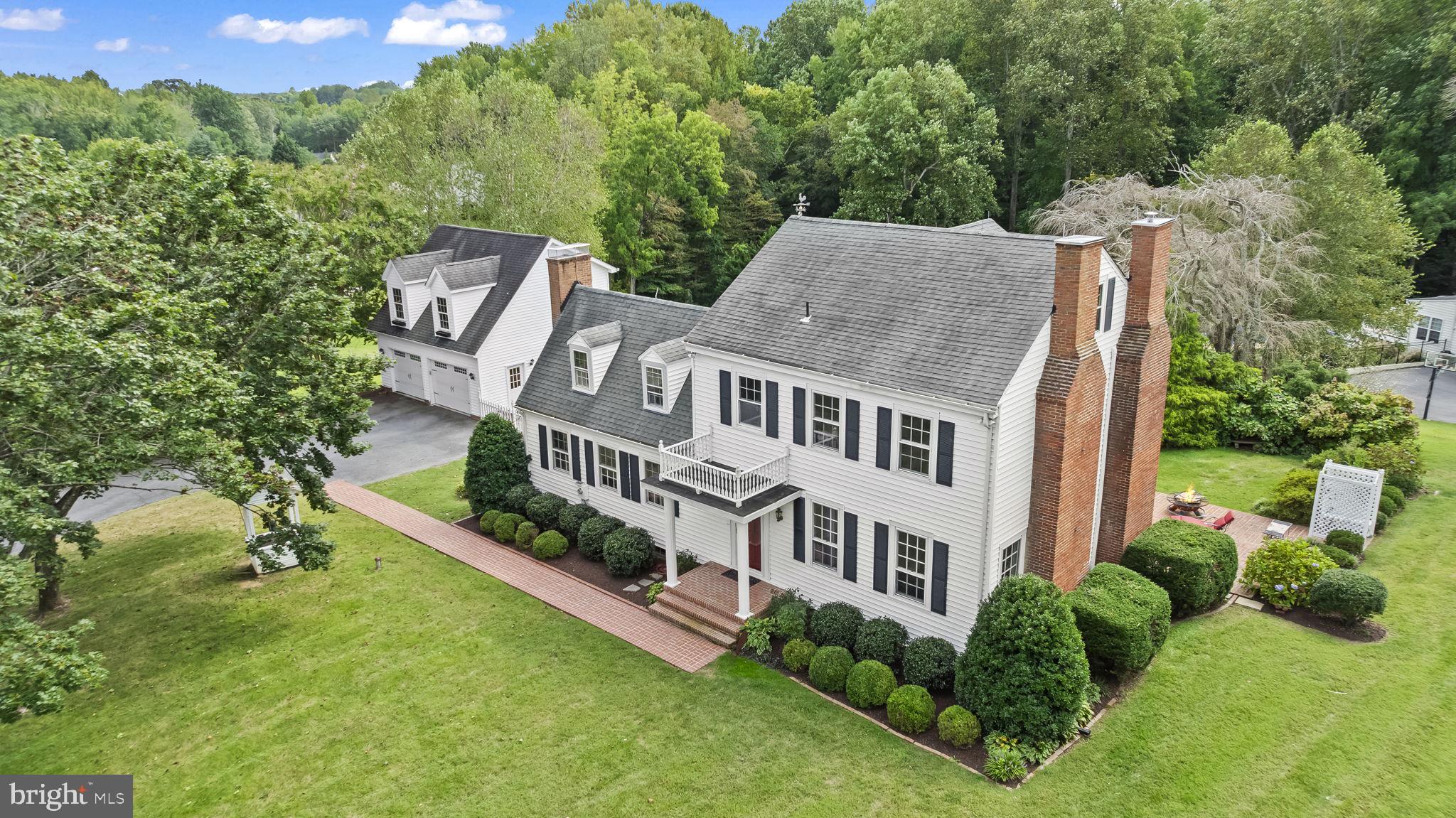 525 Small Reward Road Huntingtown, MD 20639 - Photo 56 of 67 a aerial view of a house with pool and plants