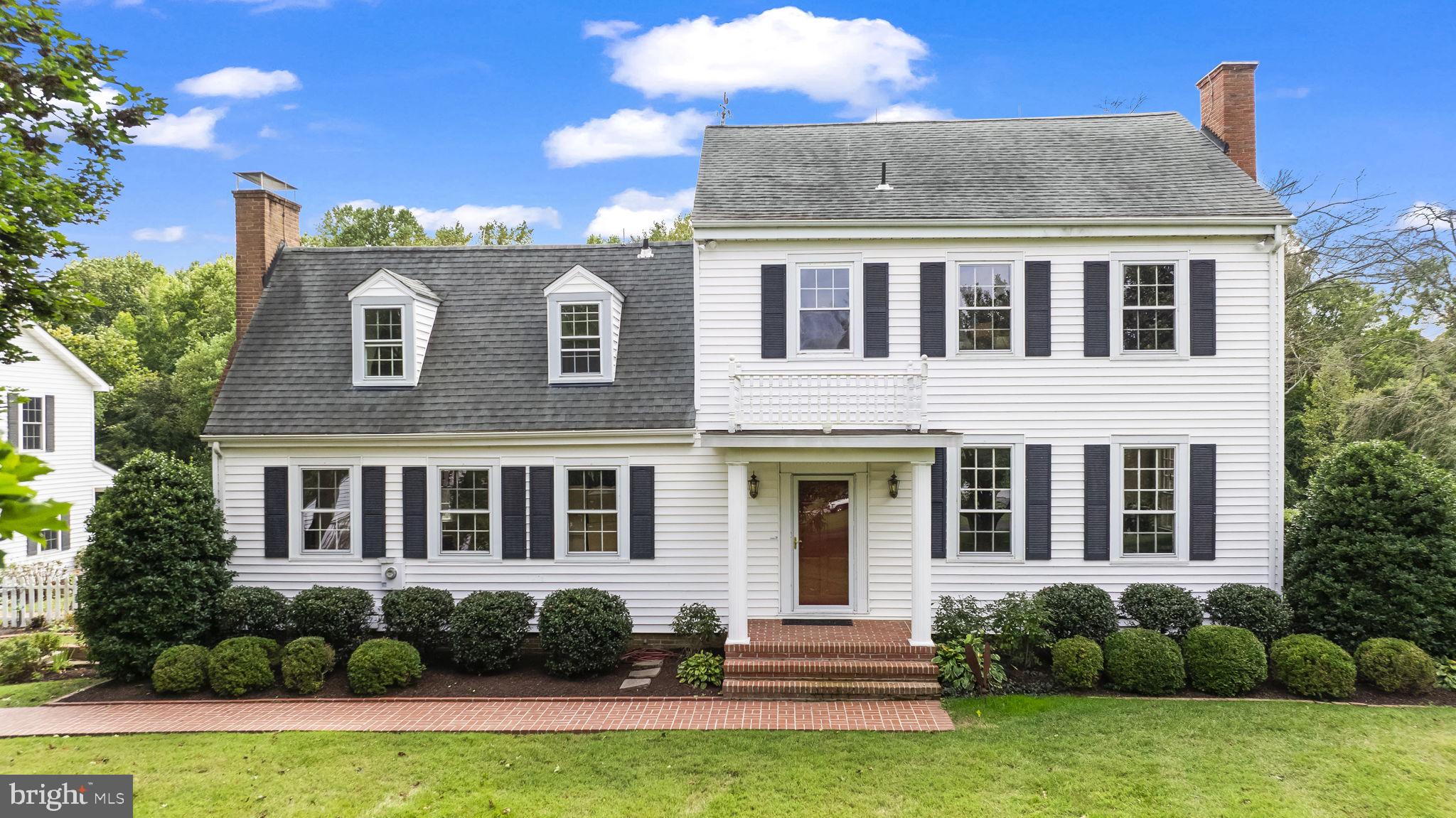 525 Small Reward Road Huntingtown, MD 20639 - Photo 58 of 67 a front view of a house with a yard