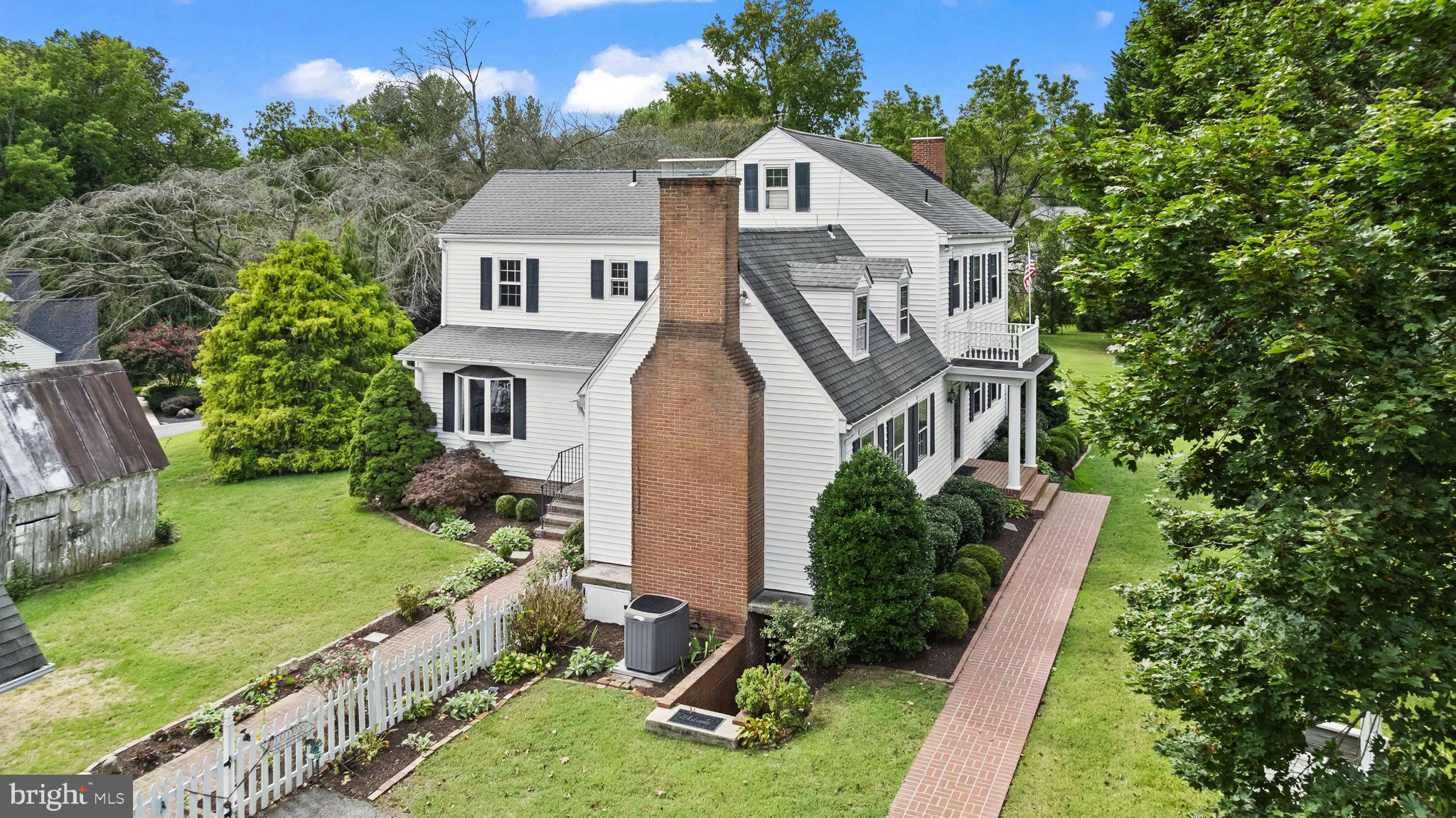 525 Small Reward Road Huntingtown, MD 20639 - Photo 60 of 67 a aerial view of a house with yard and green space