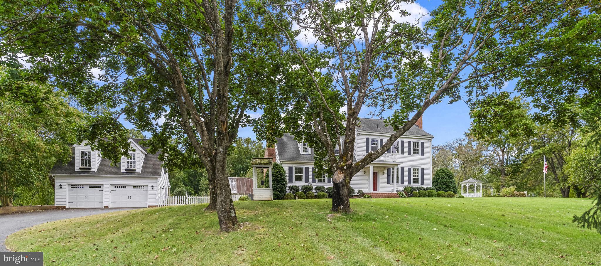525 Small Reward Road Huntingtown, MD 20639 - Photo 61 of 67 front view of a house with a tree
