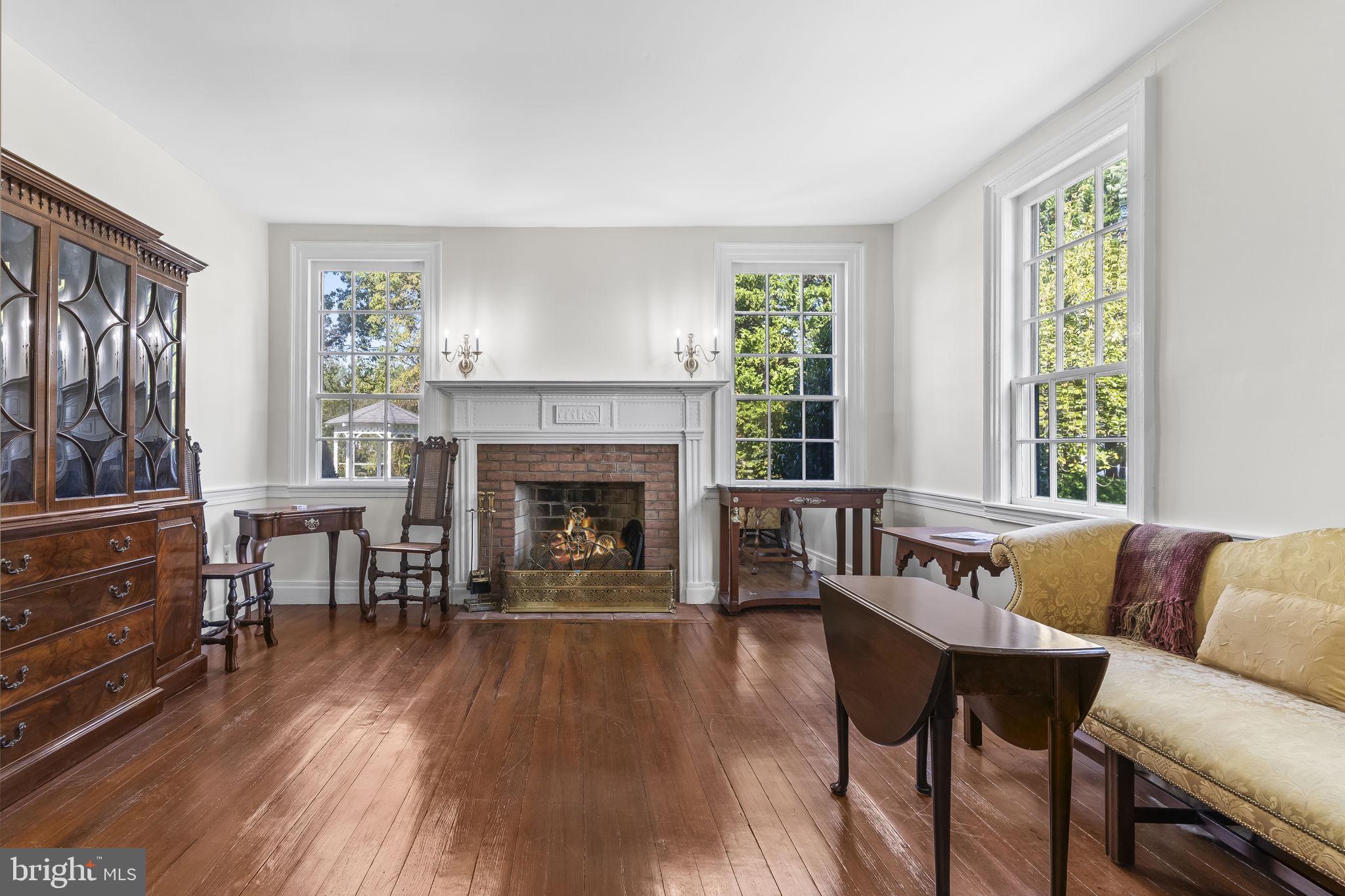 525 Small Reward Road Huntingtown, MD 20639 - Photo 10 of 67 a living room with furniture and a fireplace