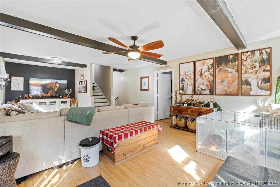1036 Pendergrass Road Sanford, NC 27330 - Photo 11 of 31 a living room with furniture and a large window