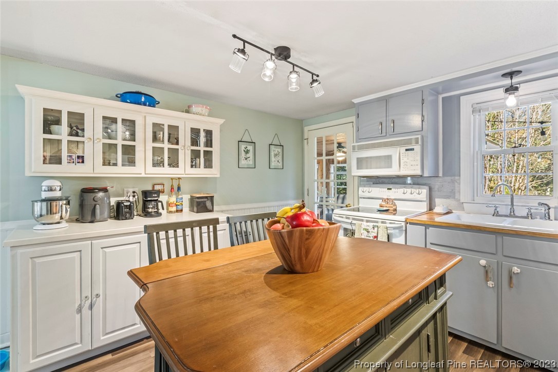 1036 Pendergrass Road Sanford, NC 27330 - Photo 24 of 31 a view of a dining room with furniture and a window