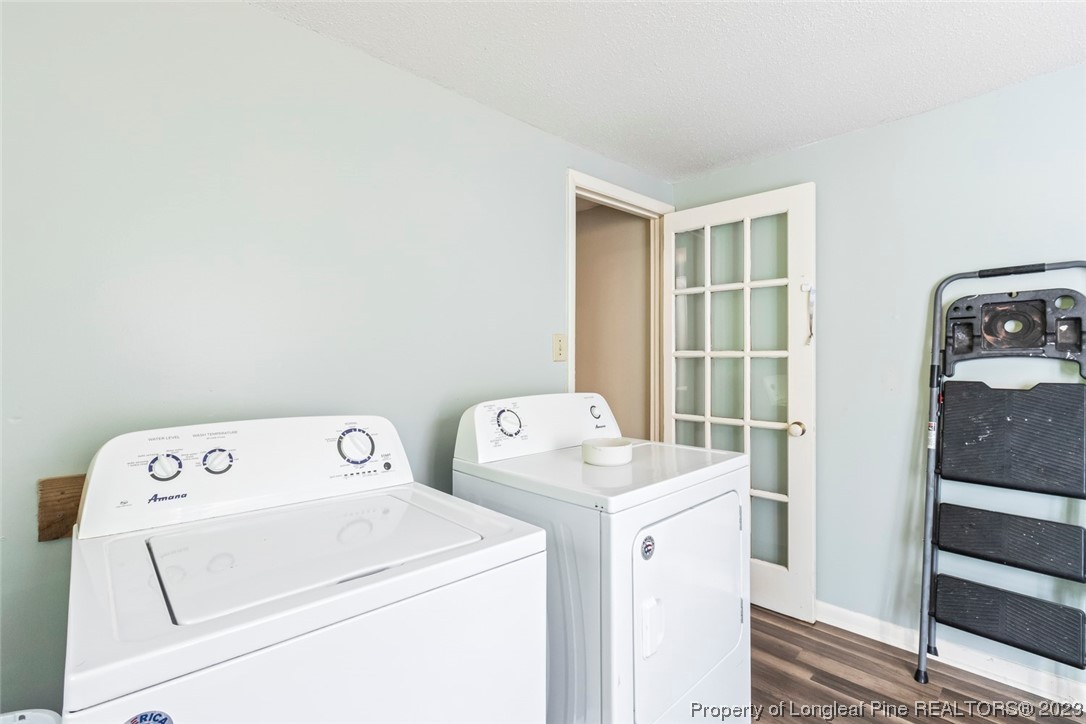 1036 Pendergrass Road Sanford, NC 27330 - Photo 31 of 31 a utility room with dryer and washer