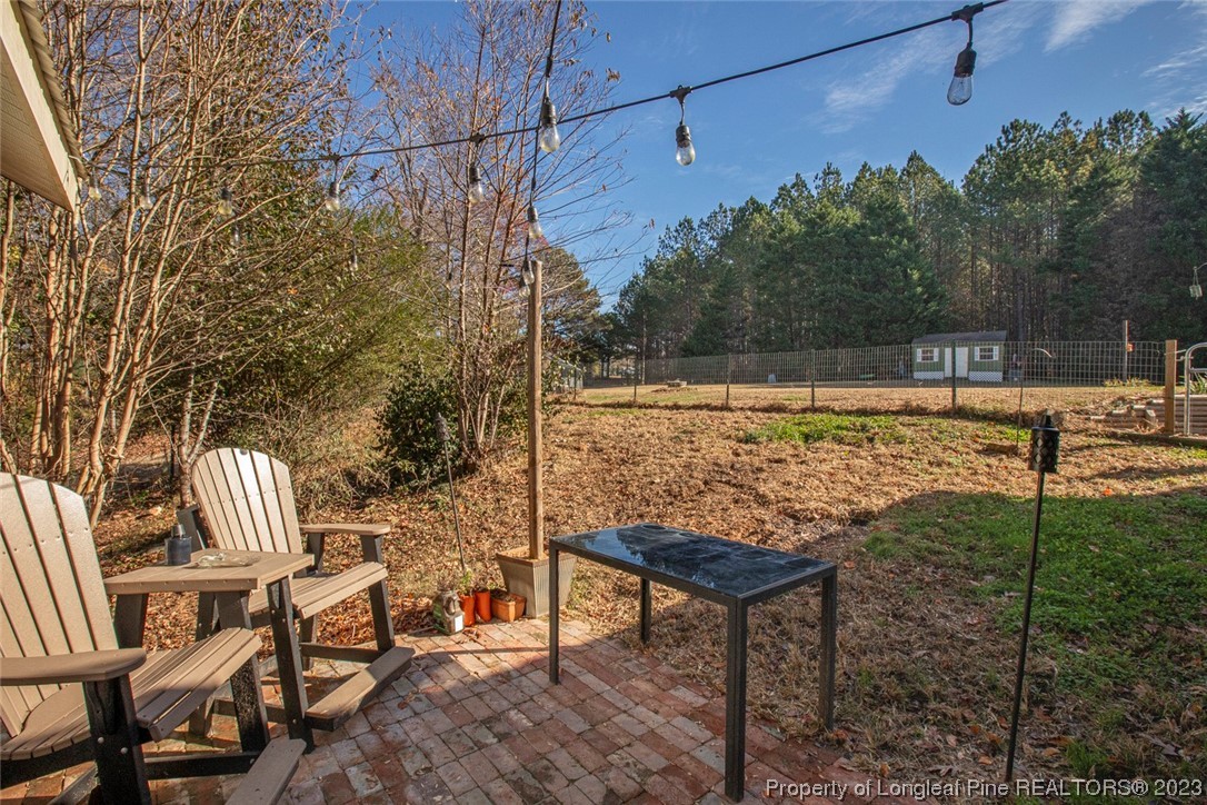 1036 Pendergrass Road Sanford, NC 27330 - Photo 9 of 31 a view of a garden with sitting area
