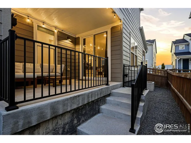 a view of a balcony with city view