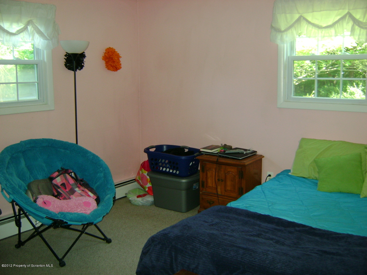 310 Bartron Road Tunkhannock, PA 18657 - Photo 8 of 12 a bed room with a bed and a chair