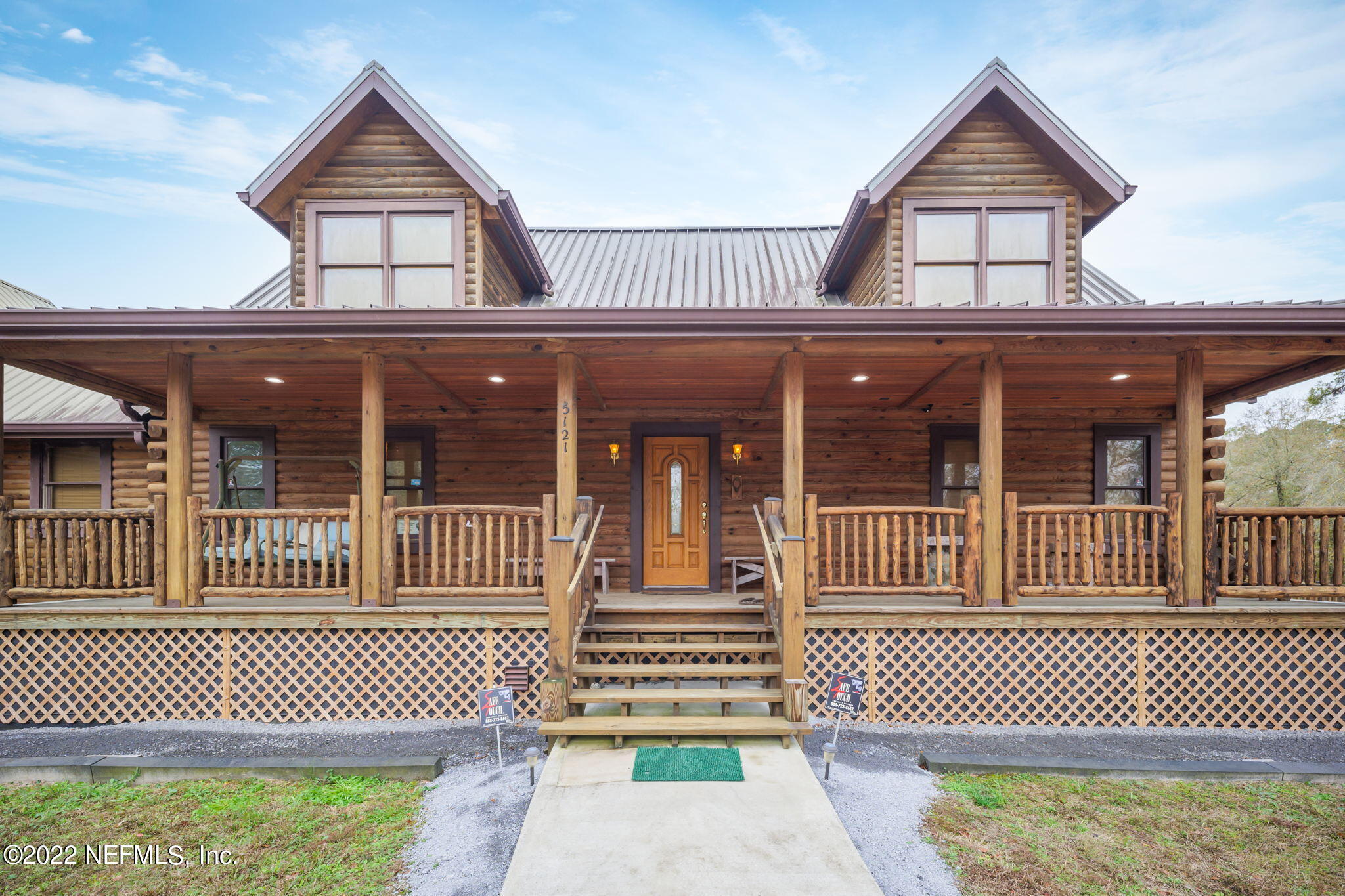 5121 Country Estates Road Middleburg, FL 32068 - Photo 4 of 58 Log Cabin Beauty