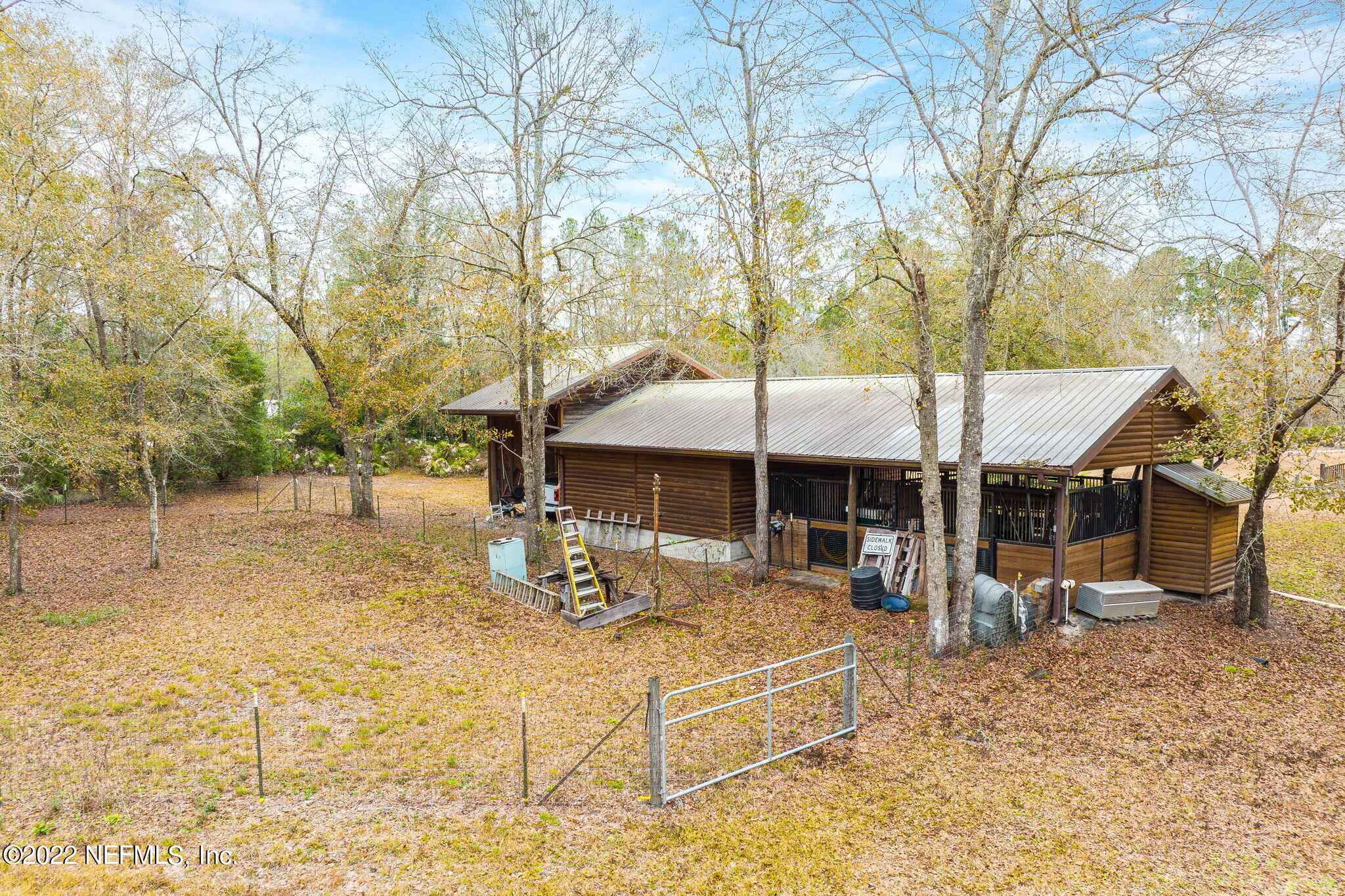 5121 Country Estates Road Middleburg, FL 32068 - Photo 48 of 58 Horse stalls & small house