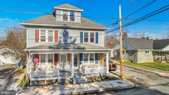 front view of a building with a fountain