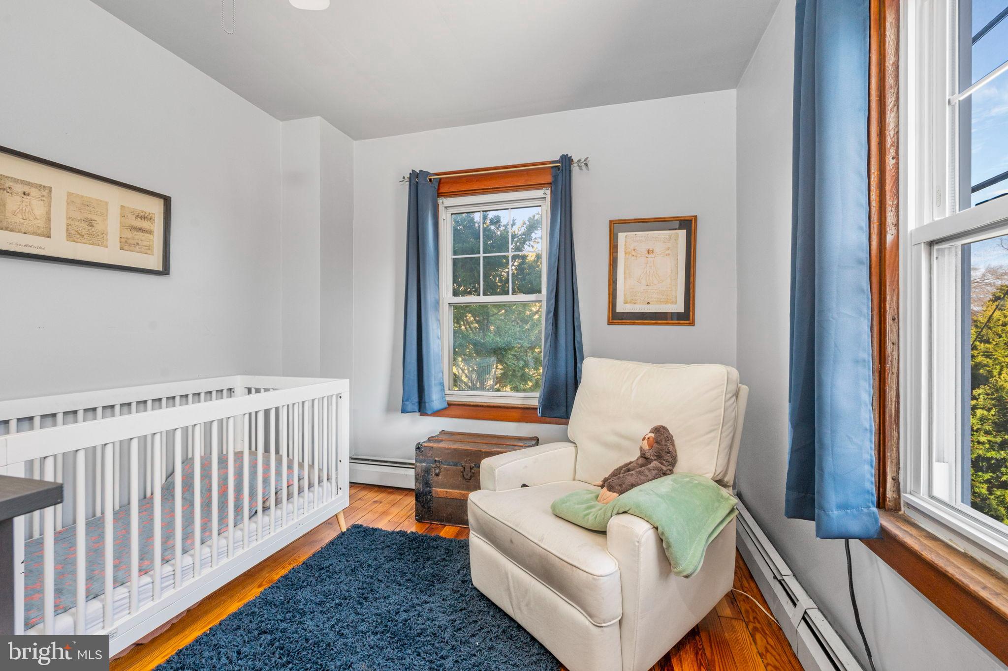 19 East 2nd Avenue Lititz, PA 17543 - Photo 14 of 32 a bedroom with furniture and a large window