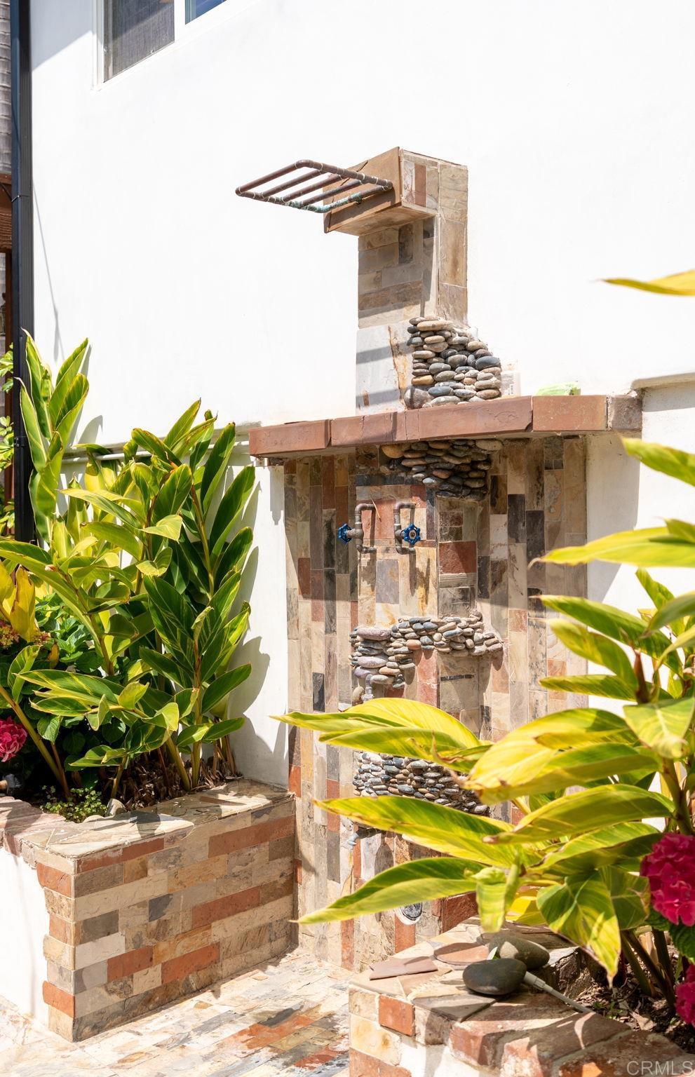 835 Dewitt Avenue, Unit B Encinitas, CA 92024 - Photo 17 of 22 a view of building with outdoor space