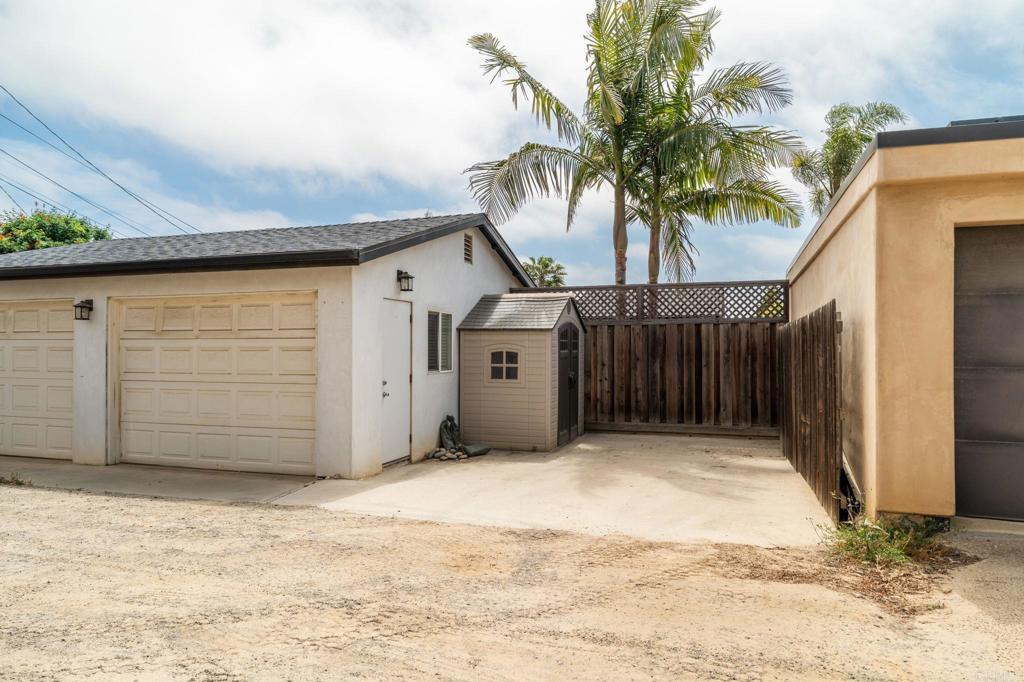 835 Dewitt Avenue, Unit B Encinitas, CA 92024 - Photo 18 of 22 a view of a house with a garage