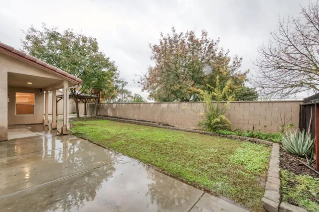 a view of a backyard with a garden