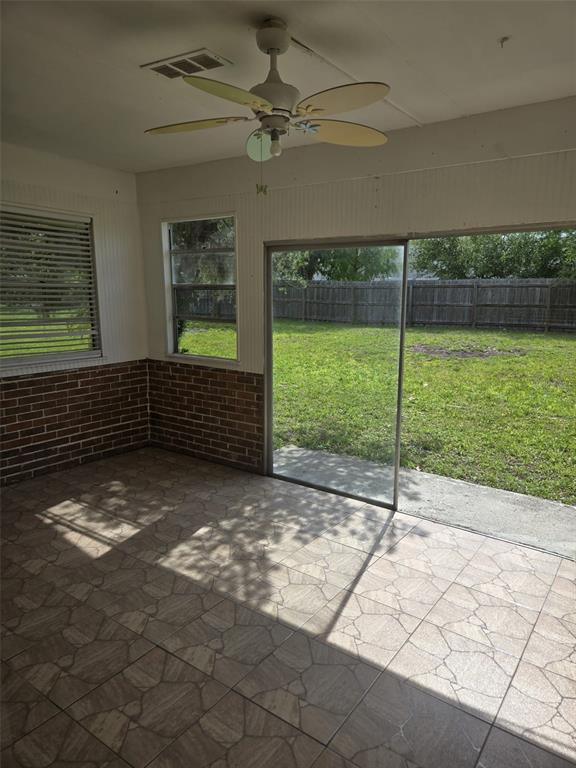 1420 Simmons Road Kissimmee, FL 34744 - Photo 20 of 21 a view of an empty room with a iron stairs