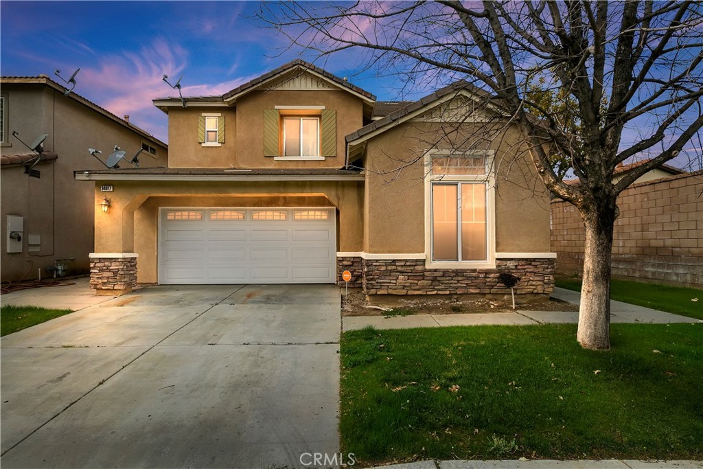 34017 Leon Street Lake Elsinore, CA 92530 - Photo 1 of 1 a front view of a house with a yard